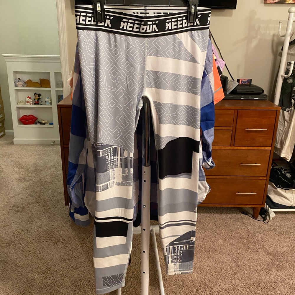 Reebok athletic tights. Worn once. Size medium.